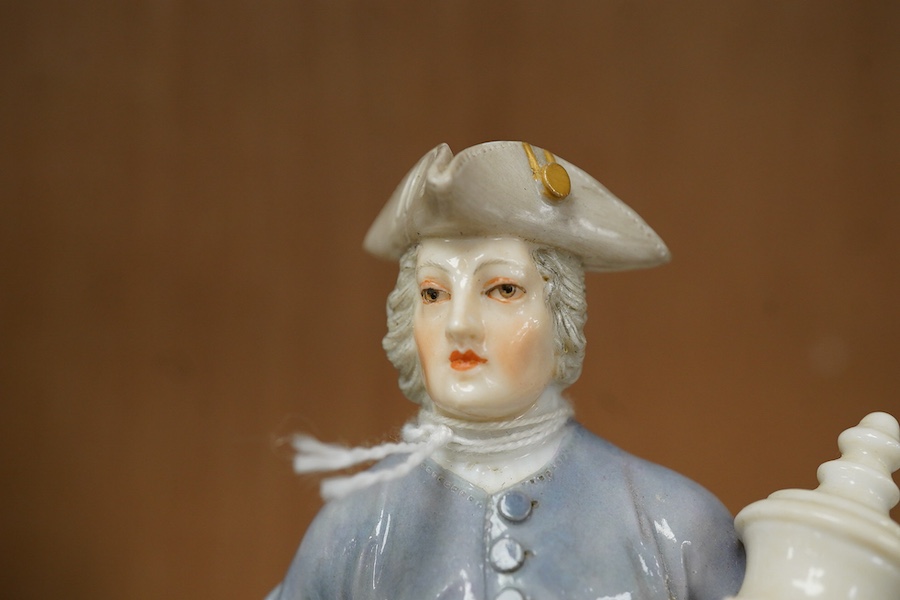 A Ludwigsburg style figure of a mason, 17.5cm high (restored)